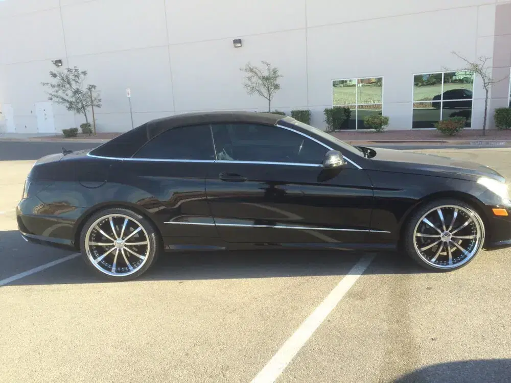 Luxury vehicle with custom rims